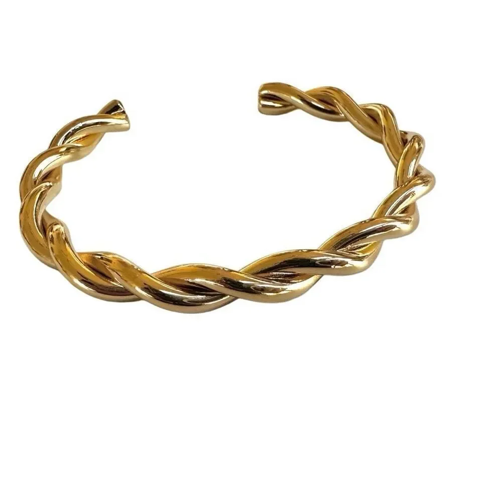 Gold tone twisted open cuff bracelet
